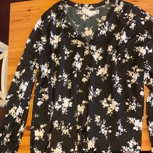 Black blouse with white flowers